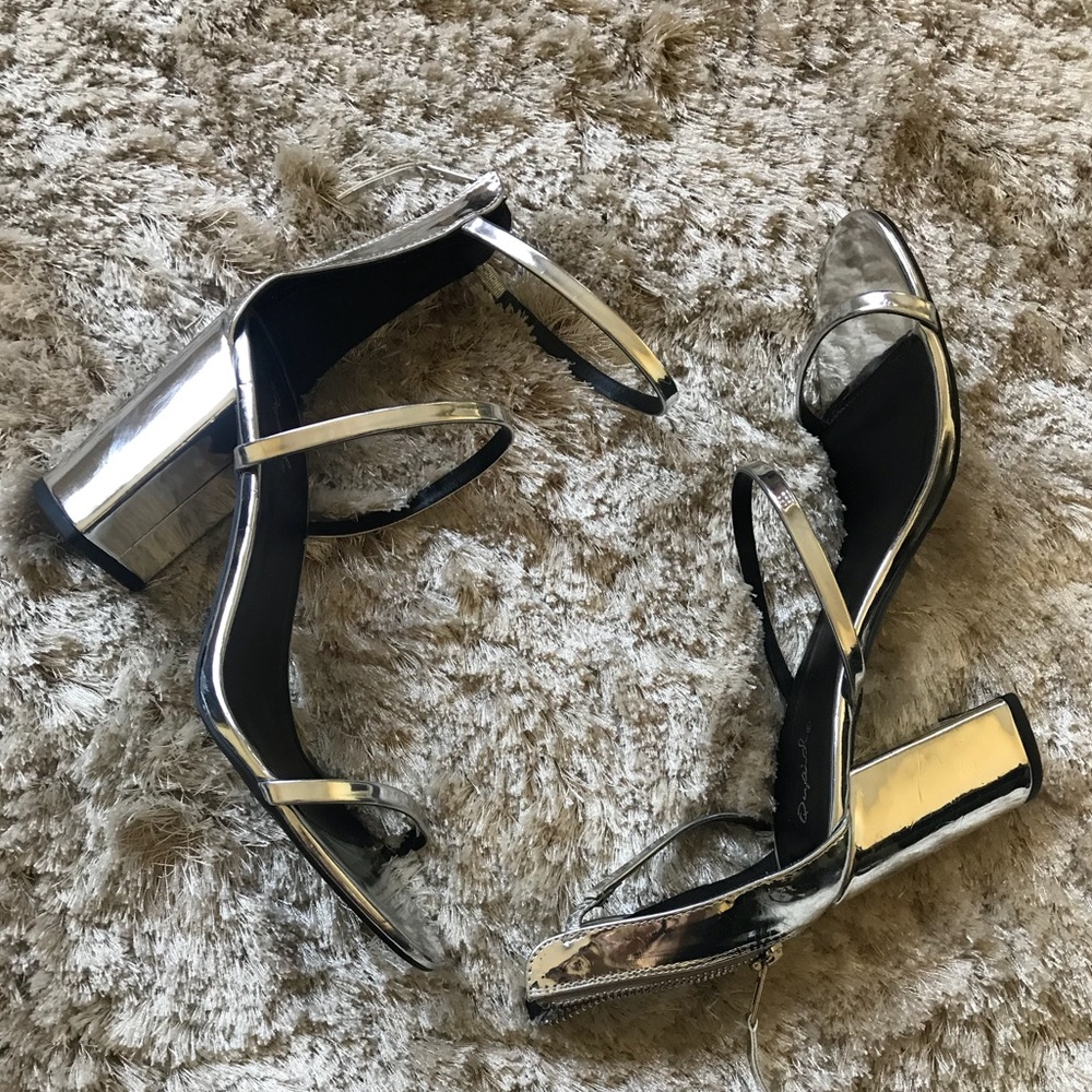 Silver Qupid heels